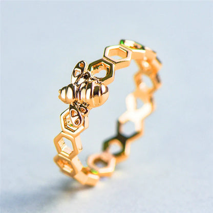 Gold and Rose Gold Colored Honeycomb Ring with Bee Accent